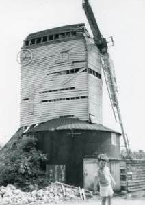 Downs Mill, Bexhill, derelict with child