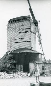 Downs Mill, Bexhill, derelict with child