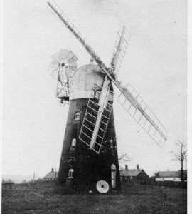 Tower mill, Barnham, with millstone