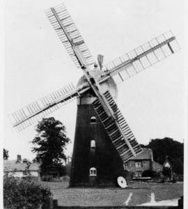 Tower mill, Barnham, with Millstone