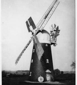Tower mill, Barnham, with millstone