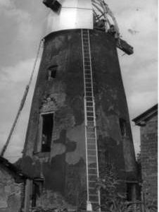 Fitting new cap, tower mill, Bardwell