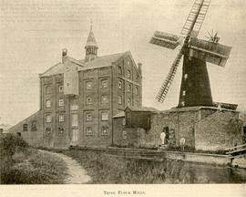 View across canal showing windmill and steam mill at Tring in Hertfordshire