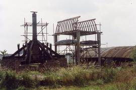 Trestle and buck frame with roof half-erected, post mill, Chinnor