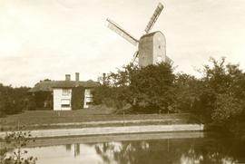 View of mill and house across river
