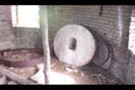 Millstone, interior of Hook's Windmill, Guilden Morden