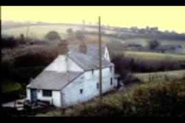 Pit mill, Roadwater, Somerset, view of mill with cottage in front