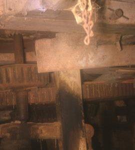 Burndhurst Mill, Loxley, Uttoxeter - stone nut and other main gears, and little wheel on wheelshaft for sack hoist