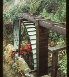 Restored wheel and launder, Wheal Martyn Mill, St Austell, Cornwall