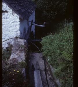 Docton Mill, Hartland, Devon, launder and roof over wheel