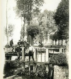 French soldiers posing on a sluice