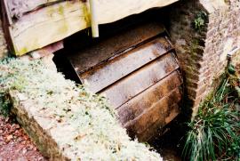 Old Loders Mill, Loders, Dorset, low breast-shot waterwheel, turning in 1990s