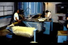 Wookey Hole Mill, paper is out of the vat, deckle on, leveur waits