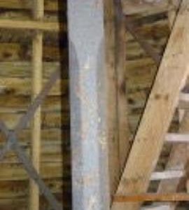 Detail of upright shaft on stone floor, smock mill, Crowfield