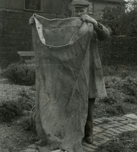 Mr Stone holding cloth from bolter, Upminster