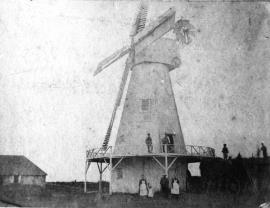 Smock mill, Aldington, with cottage and group