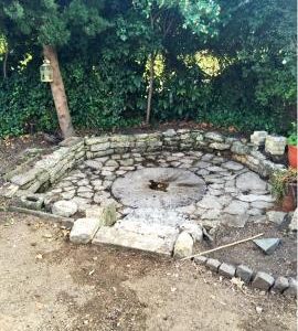Millstone from Ruskington post mill, in garden of mill house