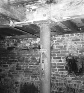 Froghall Mill, Froghall - bridge post, spurwheel recess and wheelshaft hole.