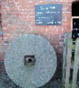 Shugborough Farm Mill, Shugborough Park, Colwich - millstone in yard and info on waterwheel
