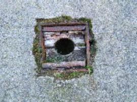Shugborough Farm Mill, Shugborough Park, Colwich - bearing in millstone in yard