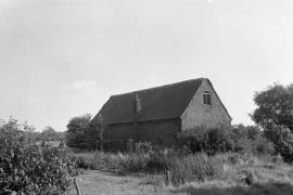Perton Mill, Perton, Wrottesley - mill seen across the dry millpond, opposite end from waterwheel end nearest camera