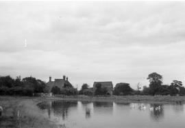 Stretton Mill, Stretton - distant general view of mill from west-southwest, with pond and farmhouse
