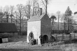 Wodehouse Mill Pumping Wheel, Wombourne - the wheelhouse of the waterwheel for barn machinery, side visible from the road
