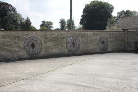 Millstones set into wall, Icklingham Mill