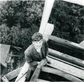 Chris Wilson climbing a fan frame