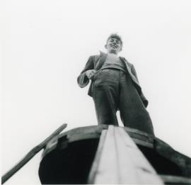 Chris Wilson standing atop Tower mill, Over's cap