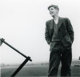 Chris Wilson standing atop Tower mill, Over's cap