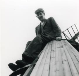 Chris Wilson sitting atop Tower mill, Over's cap