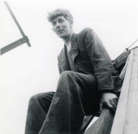 Chris Wilson sitting atop Tower mill, Over's cap