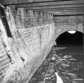 Unidentified watermill remains after a fire