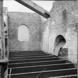 Unidentified watermill remains after a fire