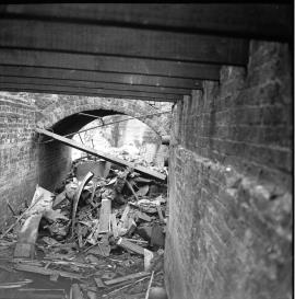 Unidentified watermill remains after a fire