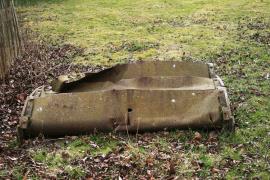 East Meon, Frogmore Mill, fragment of waterwheel on grass
