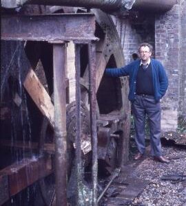 Churchill Forge, Churchill and Blakedown - millwright John Fairbanks standing by the big waterwheel