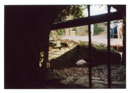 Evelith Mill, Shifnal - Millstone fragment seen from semi-basement