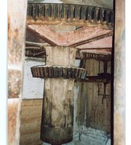 Evelith Mill, Shifnal - in the cogpit - upright shaft, wallower, great spur wheel and a stone nut