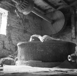 Bache Mill, Diddlebury - stones in round tun, and layshaft.