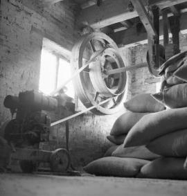 Sutton Mill, Hopstone, Claverley - sack hoist, lower pulley, motor and former drive from crown wheel