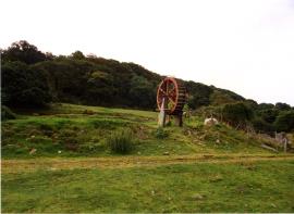 Small waterwheel near road (B4478), Melin Cochwillan, Llanllechid, Caernarvonshire